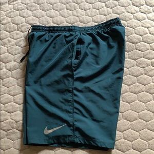 Blue nike running shorts